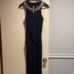 Dark blue sleeveless jumpsuit with gold tone beading